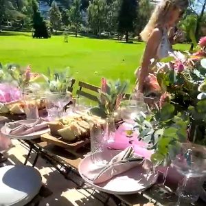 Baby shower picnic setup with elegant decor, fresh florals and tableware in an inner Melbourne garden.